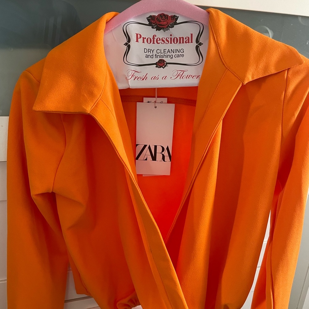 Orange long sleeve top